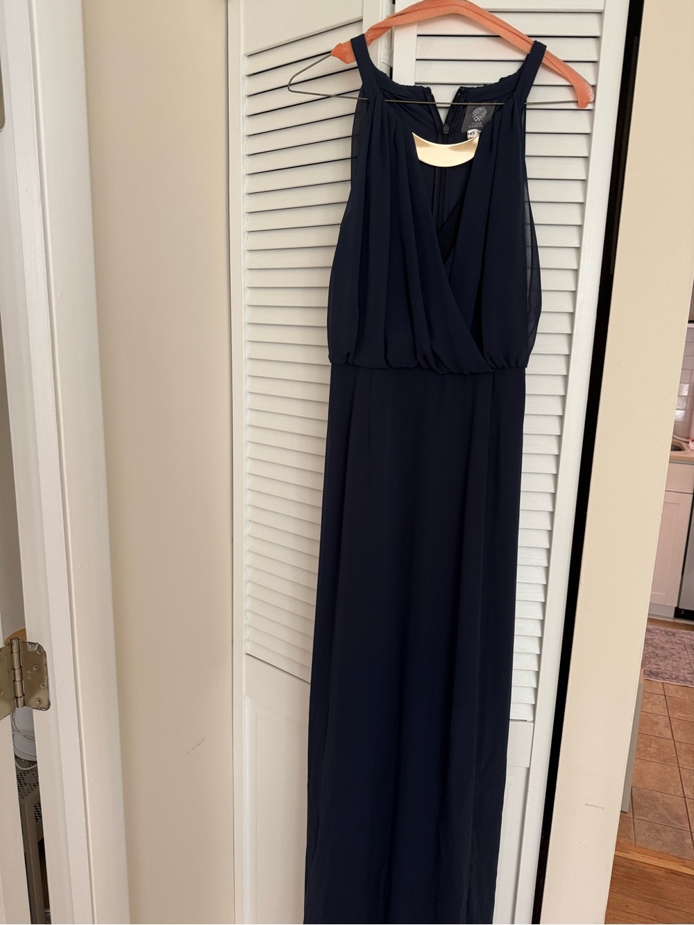 Vince Camuto Navy gown with Gold Neck Accent.
